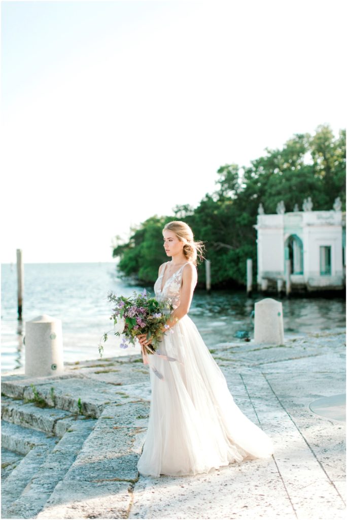 BHLDN gown, Hearst Wedding dress, silver wedding dress, Vizcaya, waterfront wedding, Miami wedding, film photography, updo, purple flowers, purple bouquet